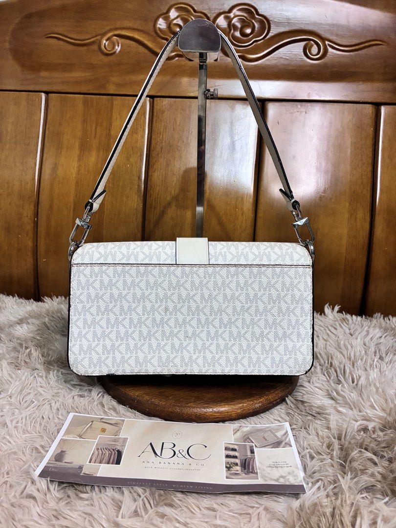 MK Greenwich Crossbody Bag (Category: Shoulder Bags) located in Subic. Submitted by anabananaco. (Listing ID 1463235053, Image 3). Description: Guaranteed authentic 👌 Preloved Bags 💼👜 From Japan 🇯🇵🎌 Issues: - no more sling strap - waves on rubber lining .