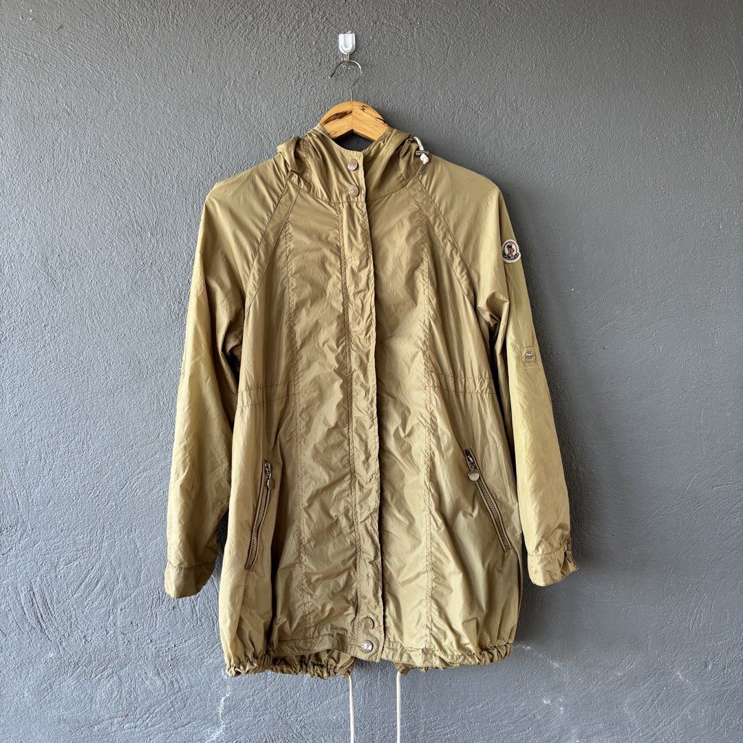 Moncler parka jacket (Category: Coats, Jackets and Outerwear) located in San Fernando. Submitted by diff.thr1ft (Listing ID 1463168709, Image 1). Description: - Brand: Moncler - Type: Parka Jacket - Color: Khaki - Features: Hood, zippered pockets, iconic logo patch, branded snaps - Material: Lightweight, durable - Condition: Excellent (as pictured) - Meetup Location: San Fernando, Pampanga.