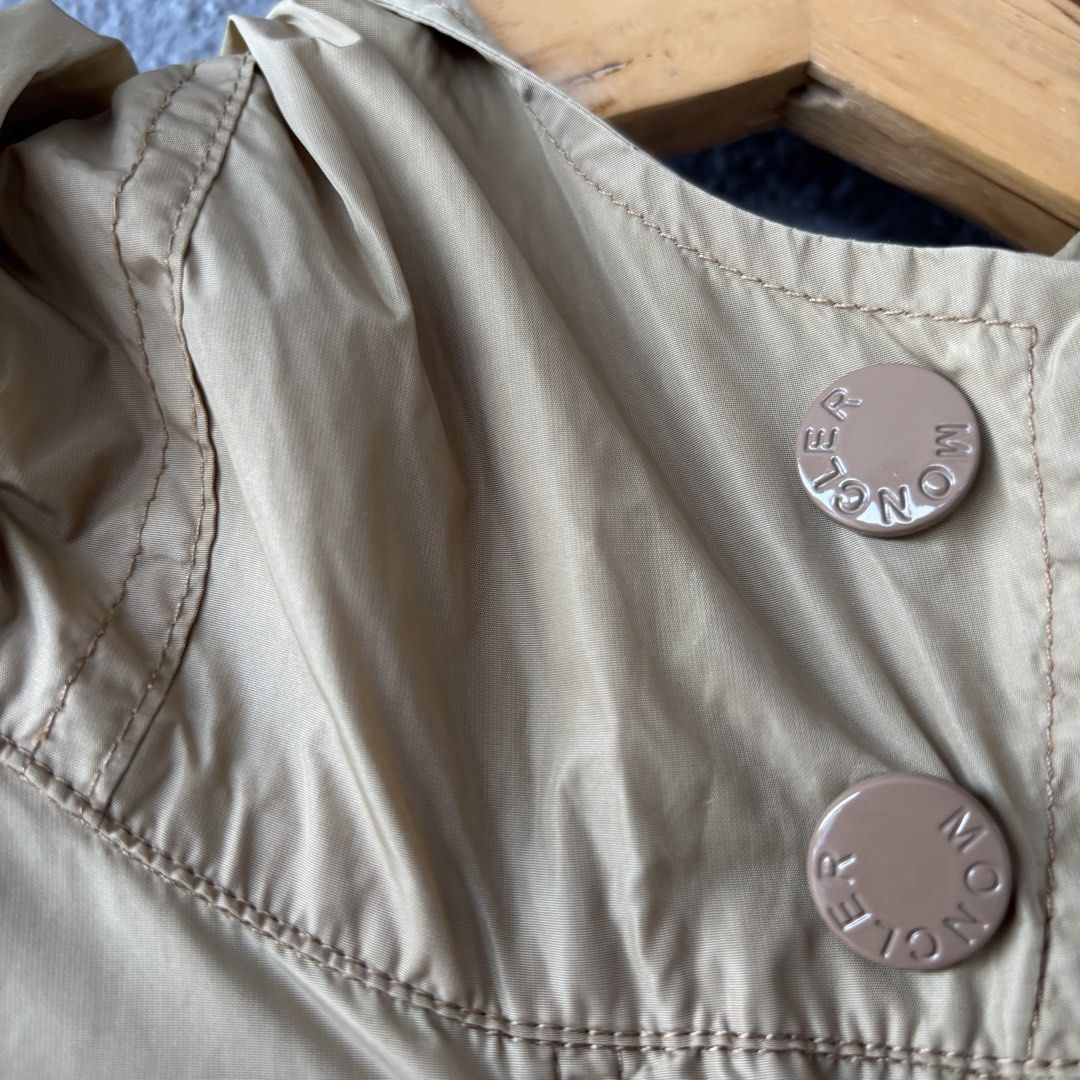 Moncler parka jacket (Category: Coats, Jackets and Outerwear) located in San Fernando. Submitted by diff.thr1ft (Listing ID 1463168709, Image 3). Description: - Brand: Moncler - Type: Parka Jacket - Color: Khaki - Features: Hood, zippered pockets, iconic logo patch, branded snaps - Material: Lightweight, durable - Condition: Excellent (as pictured) - Meetup Location: San Fernando, Pampanga.