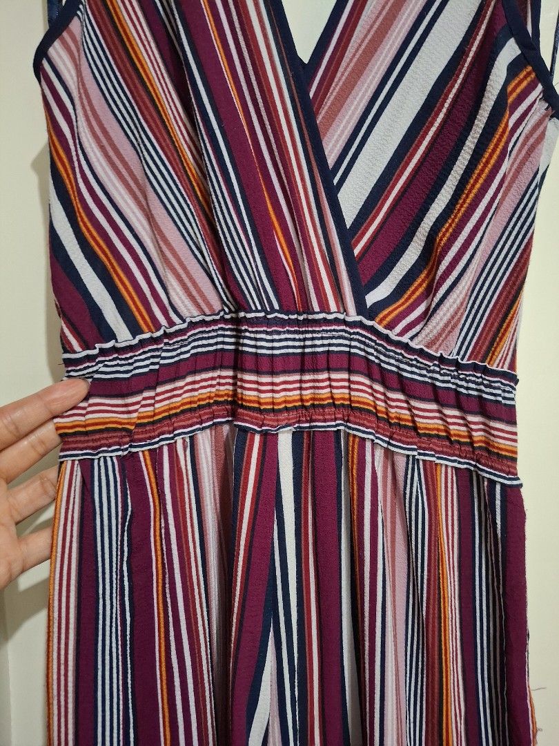 Monteau Striped Jumpsuit Size M (Category: Jumpsuits) located in Mandaluyong City. Submitted by shams2026 (Listing ID 1463167196, Image 2). Description: - Brand: Monteau - Style: Striped Jumpsuit - Colors: Burgundy, White, Navy, Orange - Features: V-neck, Cinched Waist, Wide Leg Pants - Occasion: Casual day out or night out - Benefits: Comfortable and stylish.
