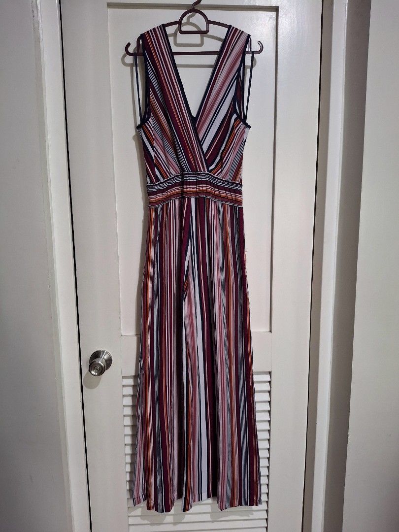 Monteau Striped Jumpsuit Size M (Category: Jumpsuits) located in Mandaluyong City. Submitted by shams2026 (Listing ID 1463167196, Image 1). Description: - Brand: Monteau - Style: Striped Jumpsuit - Colors: Burgundy, White, Navy, Orange - Features: V-neck, Cinched Waist, Wide Leg Pants - Occasion: Casual day out or night out - Benefits: Comfortable and stylish.