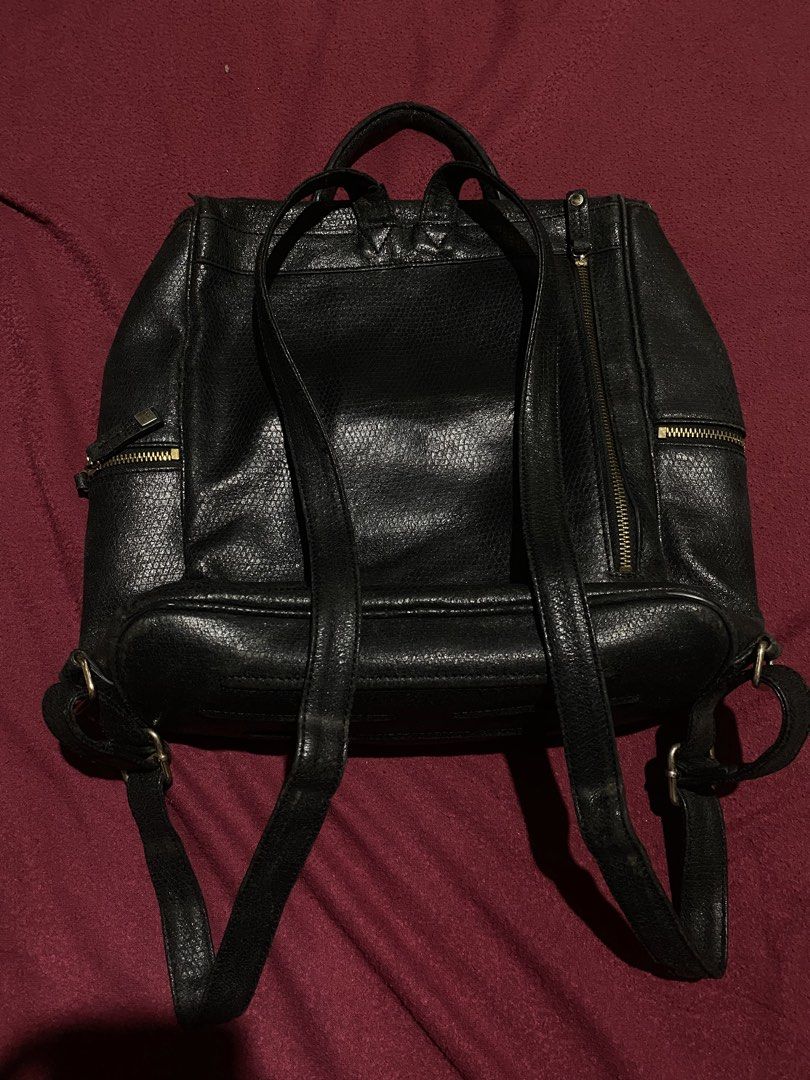 MORGAN MORGAN DE TOI LEATHER backpack WITH GOLD BOXY PATCH (Category: Luxury Bags & Wallets) located in Naga. Submitted by hubthrift2 (Listing ID 1463275676, Image 3). Description: Morgan De Toi Length-13 Width-15 Color rate-9/10 Sign of usage only Zippers are all working.