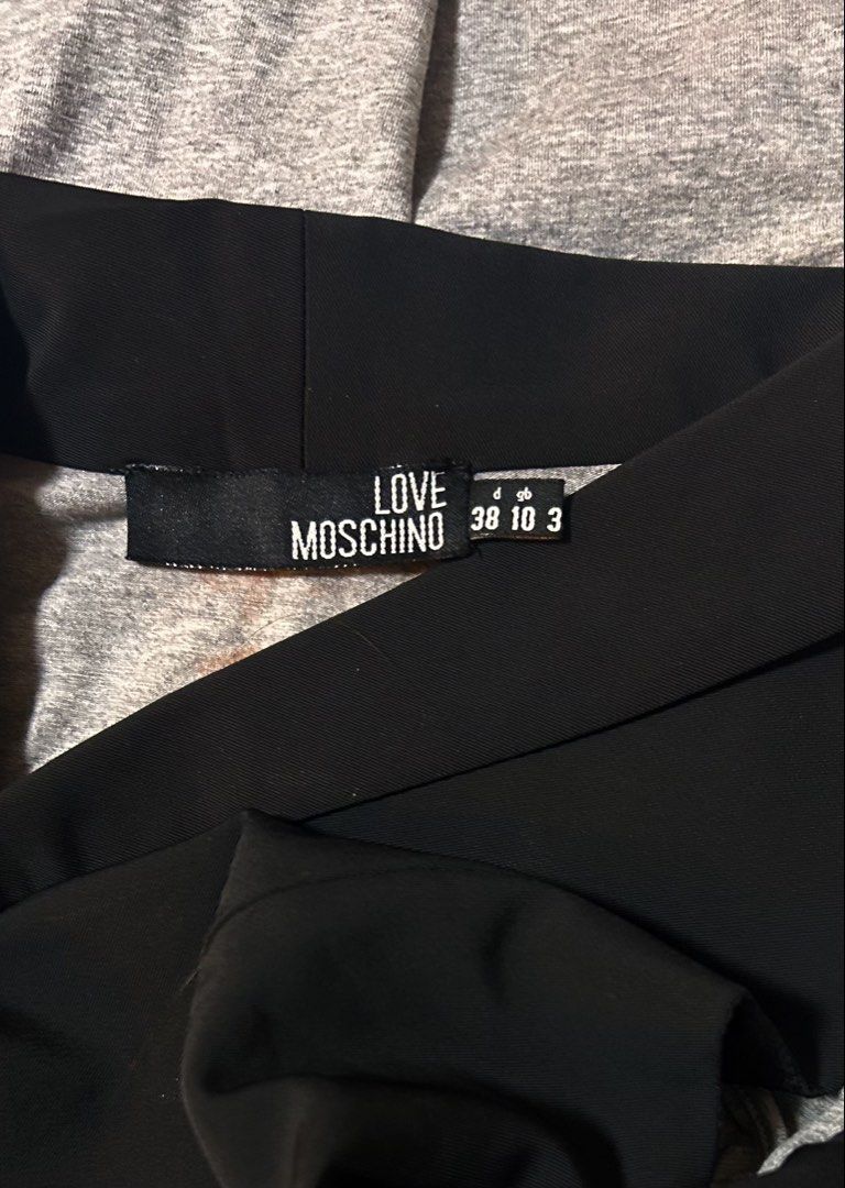 MOSCHINO (LOVE) (Category: Dresses) located in Davao. Submitted by sart0ria85 (Listing ID 1463273853, Image 3). Description: A gray stretchable dress with black built in vest. 100% COTTON MADE IN CHINA 🇨🇳 MEDIUM. Size 6 EXCELLENT CONDITION (95/100).