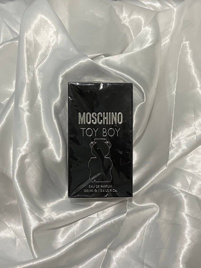 Moschino Toy Boy Eau De Parfum 100ml (Category: Fragrance & Deodorants) located in Manila. Submitted by k1win4wi (Listing ID 1463132504, Image 1). Description: - Moschino Toy Boy Eau De Parfum - 100ml bottle - Made in Italy - Reference: 6W10 65% VOL - Please check photos for condition and details - Selling for my school fund.