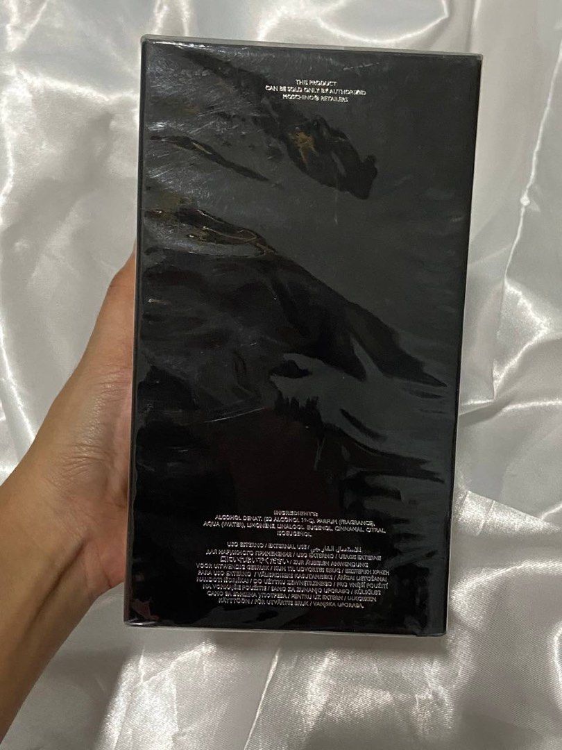 Moschino Toy Boy Eau De Parfum 100ml (Category: Fragrance & Deodorants) located in Manila. Submitted by k1win4wi (Listing ID 1463132504, Image 3). Description: - Moschino Toy Boy Eau De Parfum - 100ml bottle - Made in Italy - Reference: 6W10 65% VOL - Please check photos for condition and details - Selling for my school fund.