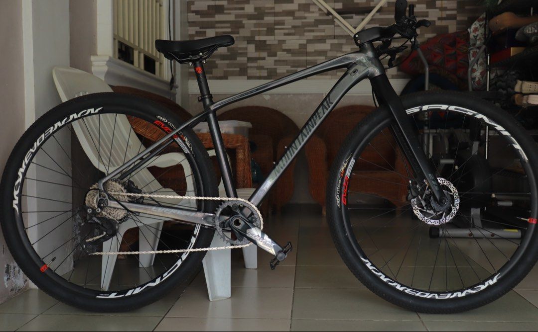 MountainPeak Everest 2 (Category: Bicycles) located in General Trias. Submitted by petarpetarpetar (Listing ID 1463134576, Image 1). Description: NEGO (Fast and Lightweight) *Naka carbon parts* POGIII ❗️Color: Chameleon Gray ❗️Frame: Mountainpeak Everest 2 (Size L / 27.5) - Quadruple Butted Alloy / Thru-Axle ❗️Cockpit: Kocevlo Integrated Handlebars (Internal Routing) (CARBON) ❗️Wheelset: Tanke TH390 Hubs (120 Clicks / Tunog Mayaman) 29er Sagmit E