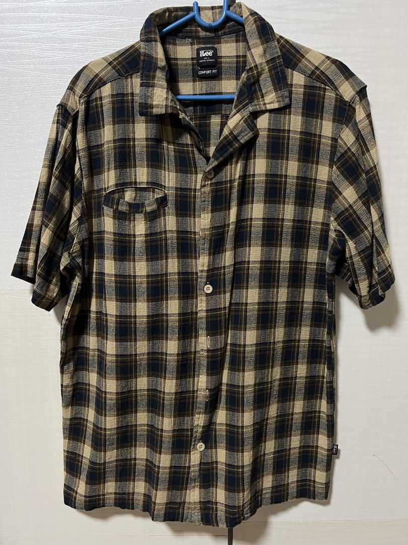 Mr. Lee Comfort fit Polo (Category: Tshirts & Polo Shirts ) located in Marikina City. Submitted by haradrim (Listing ID 1463304205, Image 1). Description: Mr. Lee Comfort fit checkered polo Color: Brown, dark blue combi No discoloration L: 27" W: 21".