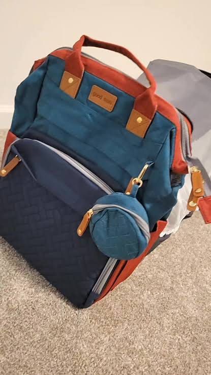 Multi-functional Diaper Bag Backpack with Bassinet (Category: Diaper Bags & Wetbags) located in Manila. Submitted by loveditemsbyj (Listing ID 1463170732, Image 2). Description: - Spacious diaper bag backpack - Multiple compartments for organization - Insulated pockets for bottles - Built-in portable bassinet for on-the-go naps - Durable material - Includes a small changing pad pouch.