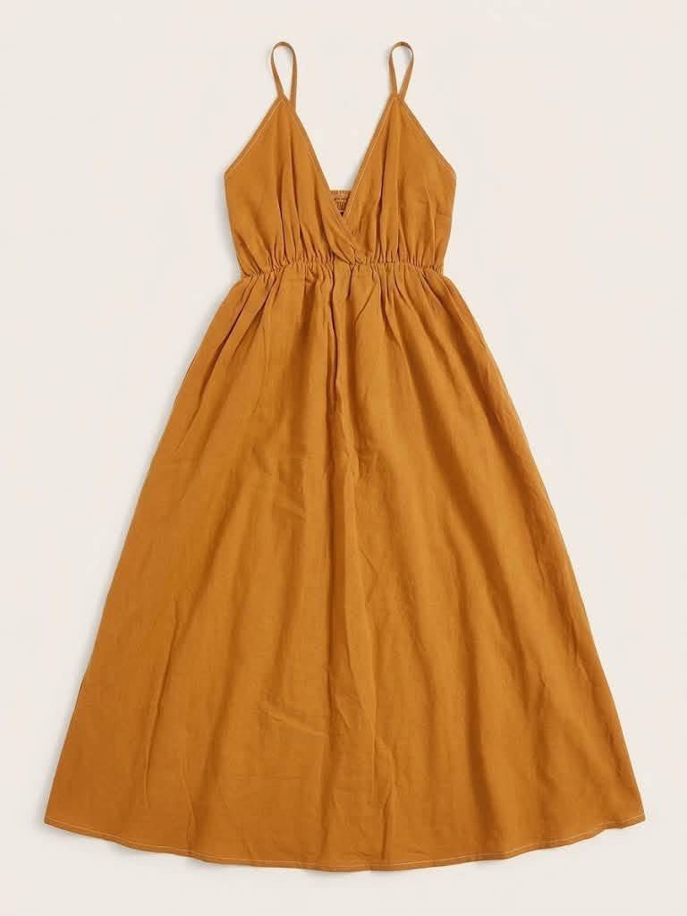 Mustard Yellow Spaghetti Strap Midi Dress (Category: Dresses) located in Guagua. Submitted by adventurousa (Listing ID 1463125752, Image 1). Description: - Cute mustard yellow midi dress - V-neckline - Adjustable spaghetti straps - Elastic cinched waist for a flattering fit - Flowy skirt - Ideal for casual outings or beach days.