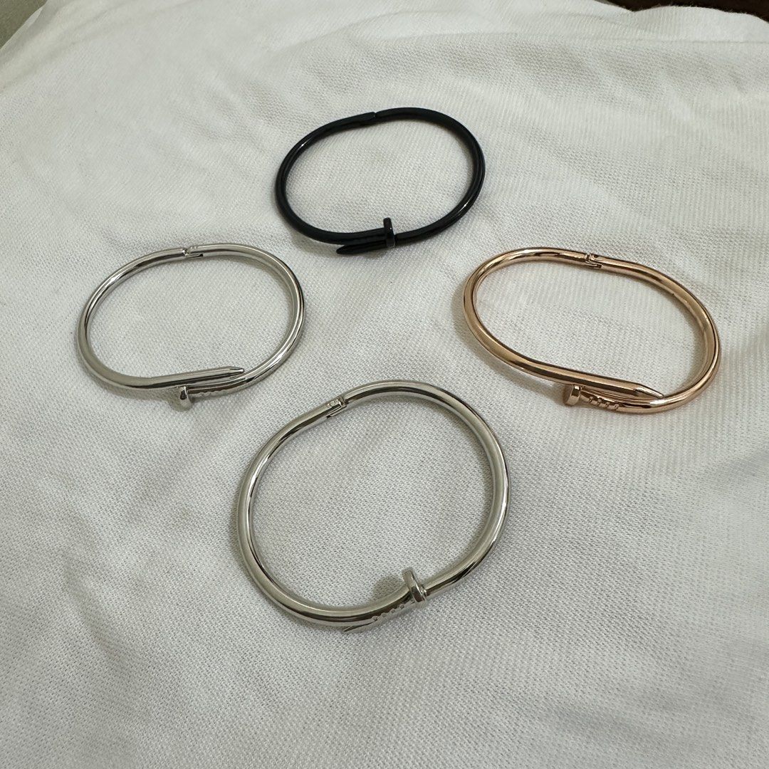 Nail Bangle Bracelets - Silver, Rose Gold, Black (Category: Bracelets) located in Bulacan. Submitted by enne_123 (Listing ID 1463238739, Image 1). Description: - ₱150 each - Available in Silver, Rose Gold, and Black. - Silver bangles feature an adjustable, open-cuff design. - Versatile for stacking with other bracelets or wearing as a statement piece..