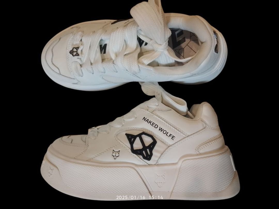 Naked Wolfe Crash Leather Sneakers - White (Category: Sneakers) located in Manila. Submitted by april_sixteen (Listing ID 1463184116, Image 1). Description: - White Naked Wolfe platform sneakers - Signature wolf logo on the side - "NAKED WOLFE" text on the heel - Chunky sole for extra height - Lace-up front - Adds a statement to any outfit.