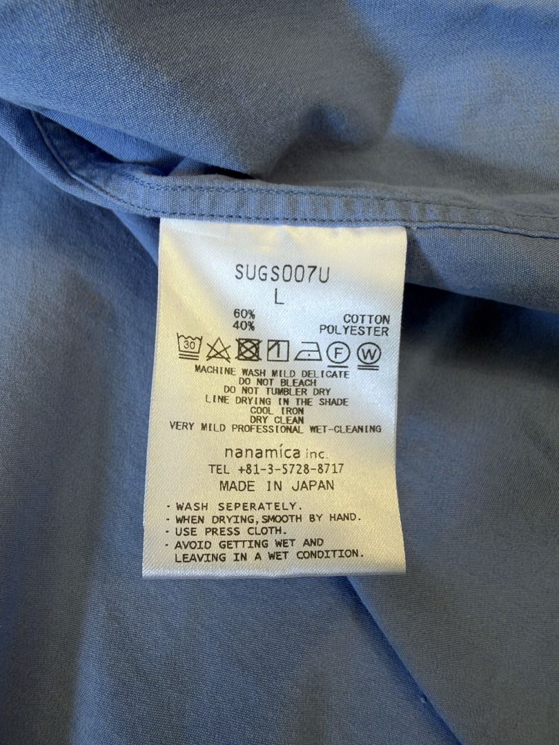 NANAMICA REGULAR COLLAR WIND SHIRT SAX （分類：T-shirt、恤衫、有領衫）位於 Hong Kong。 由 ilcky 提交（商品編號 1463160086，圖片 4）。簡介： NANAMICA REGULAR COLLAR WIND SHIRT SAX SIZE: L CONDITION: 80% 靚料挺身 靚藍色 左前下擺有輕微染色 領口位歲月關係微發黃 見圖5/6。