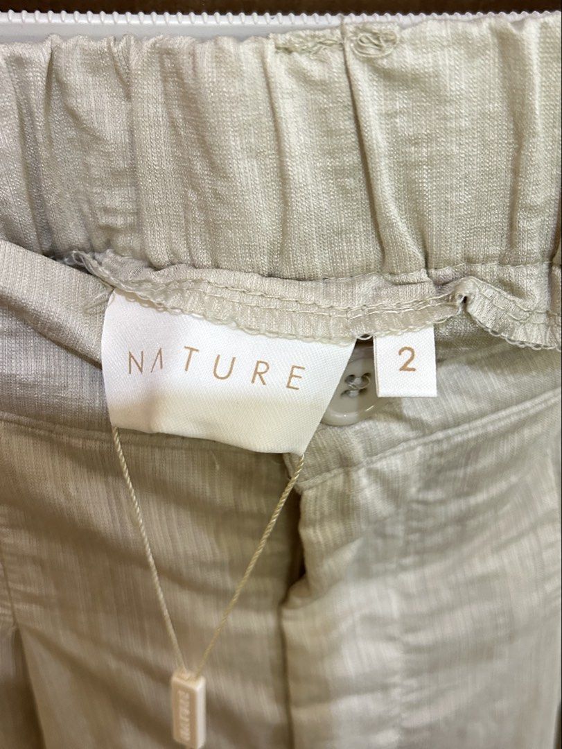 NATURE Ribbon Pants Freesize Beige (Category: Other Bottoms) located in Baguio. Submitted by tresmariascloset13 (Listing ID 1463174903, Image 3). Description: - Brand: NATURE - Color: Beige - Size: Freesize - Style: Ribbon pant, wide leg - Features: Textured fabric, elastic waistband at back - Condition: Brand new with tags attached .