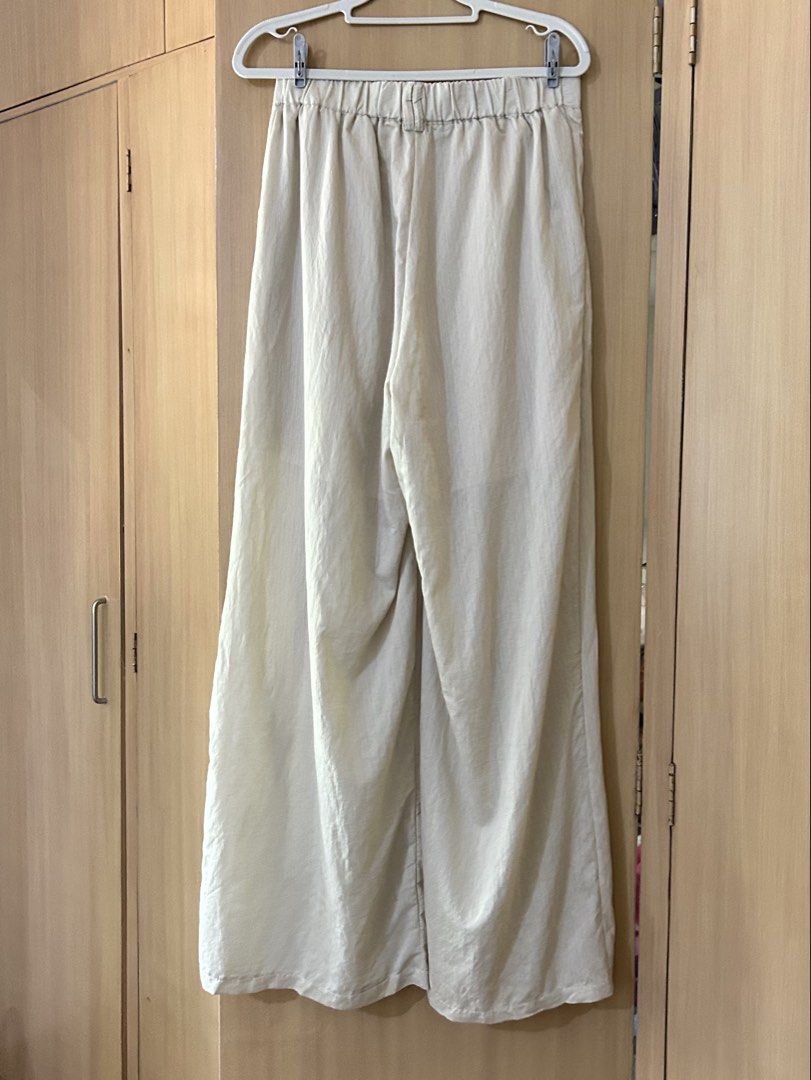 NATURE Ribbon Pants Freesize Beige (Category: Other Bottoms) located in Baguio. Submitted by tresmariascloset13 (Listing ID 1463174903, Image 2). Description: - Brand: NATURE - Color: Beige - Size: Freesize - Style: Ribbon pant, wide leg - Features: Textured fabric, elastic waistband at back - Condition: Brand new with tags attached .