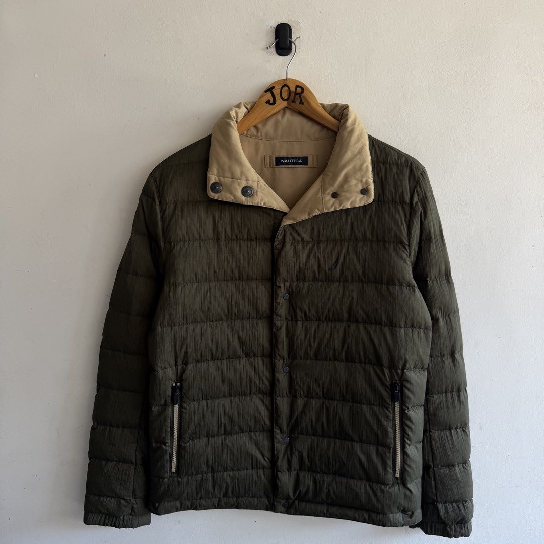 Nautica Reversible Padded Jacket (Category: Coats, Jackets and Outerwear) located in San Fernando. Submitted by jorjorr (Listing ID 1463196934, Image 1). Description: Nautica Reversible Padded Jacket Medium on tag 22 width 27 length Excellent condition No issue P1,799.