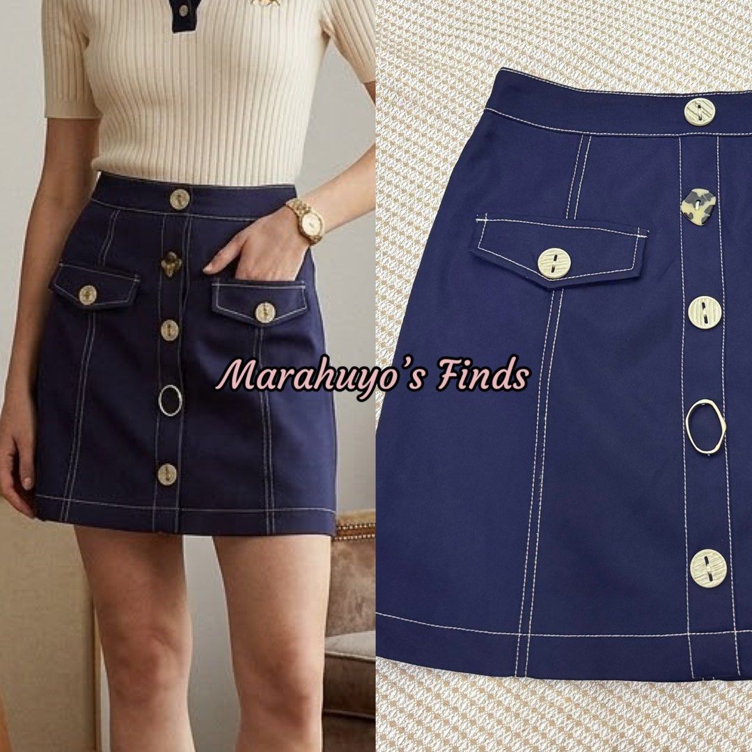 Navy Blue Button-Front A-Line Skirt with Contrast Stitching (Category: Skirts) located in Mabalacat. Submitted by marahuyos.finds (Listing ID 1463231234, Image 2). Description: - Cute navy blue skirt - Features contrast stitching all over - Button front closure - Two front pockets with button details - Belt loops on waistband - Versatile styling: casual or dressed up - Size: XS.