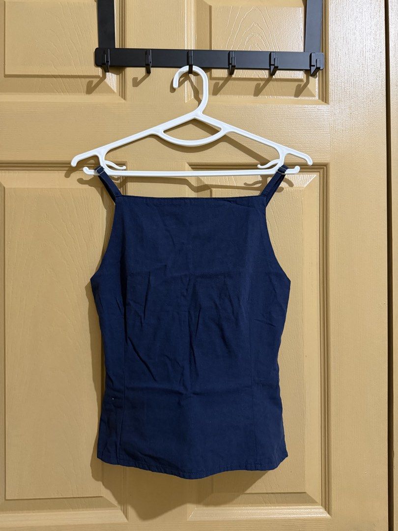 Navy Blue Square Neck Smocked Back Crop Top (Category: Sleeveless) located in Manila. Submitted by chavirly (Listing ID 1463267433, Image 1). Description: - Navy blue crop top - Square neckline with adjustable straps - Smocked back for a comfortable, flexible fit - Estimated size: Small to Medium - Perfect for casual outings or dressing up.