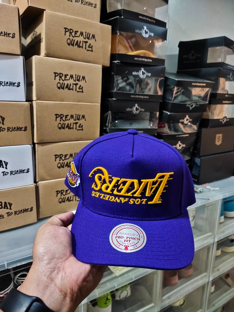 NBA Lakers Upside Logo (Category: Caps & Hats) located in Quezon City. Submitted by kema2191 (Listing ID 1463174486, Image 1). Description: With culture kings box.