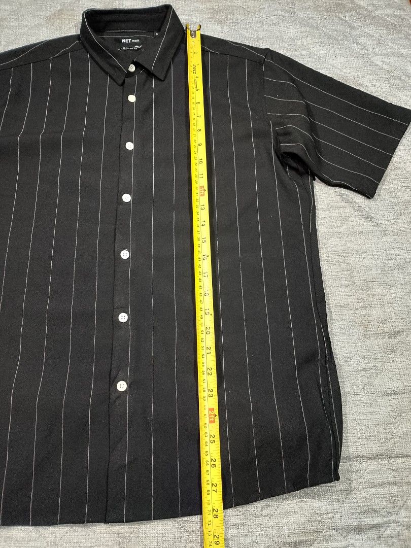 Net men black pinstripe button down short sleeve shirt (Category: Tshirts & Polo Shirts ) located in Cadiz. Submitted by comradstuff (Listing ID 1463128889, Image 3). Description: Net men black pinstripe button down short sleeve shirt w 22" l 28".