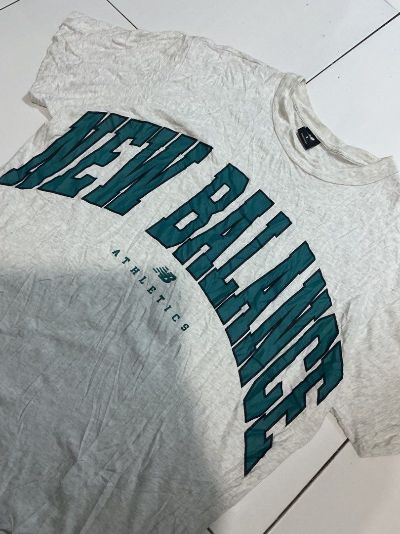 New Balance Arch Script Tshirt (Category: Tshirts & Polo Shirts ) located in Mabalacat. Submitted by dagz_thrift (Listing ID 1463278632, Image 2). Description: Fresh from bale need wash Dimes 21.5 x 29 Good Condition Issue 1 pinhole .