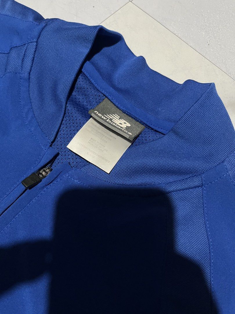 New Balance Baseball Pullover Jacket (Category: Coats, Jackets and Outerwear) located in Cavite. Submitted by christianzuuu (Listing ID 1463131072, Image 2). Description: - Blue New Balance baseball pullover jacket - Quarter zip closure - Features the 'S' baseball logo on the front - Made of durable polyester - Ideal for training sessions or everyday casual wear.