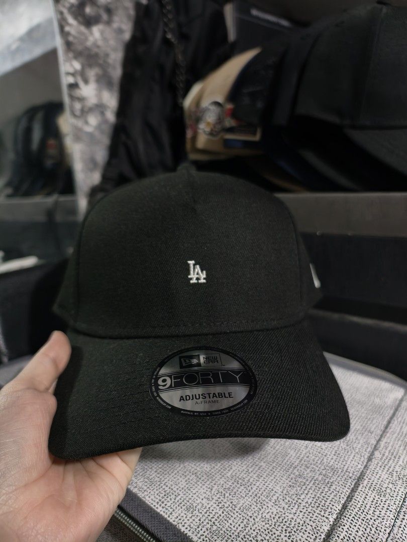 New Era 9FORTY LA Mirco logo A frame (Category: Caps & Hats) located in Bulacan. Submitted by casperchiu2798 (Listing ID 1463283494, Image 2). Description: New Era 9forty Aframe LA Micro logo - liked new condition - no issue - 100% Polyester - check pics for details RFS: sobrang dami ng black/white NE caps lalamove/LBC/J&T SJDM Bulacan.