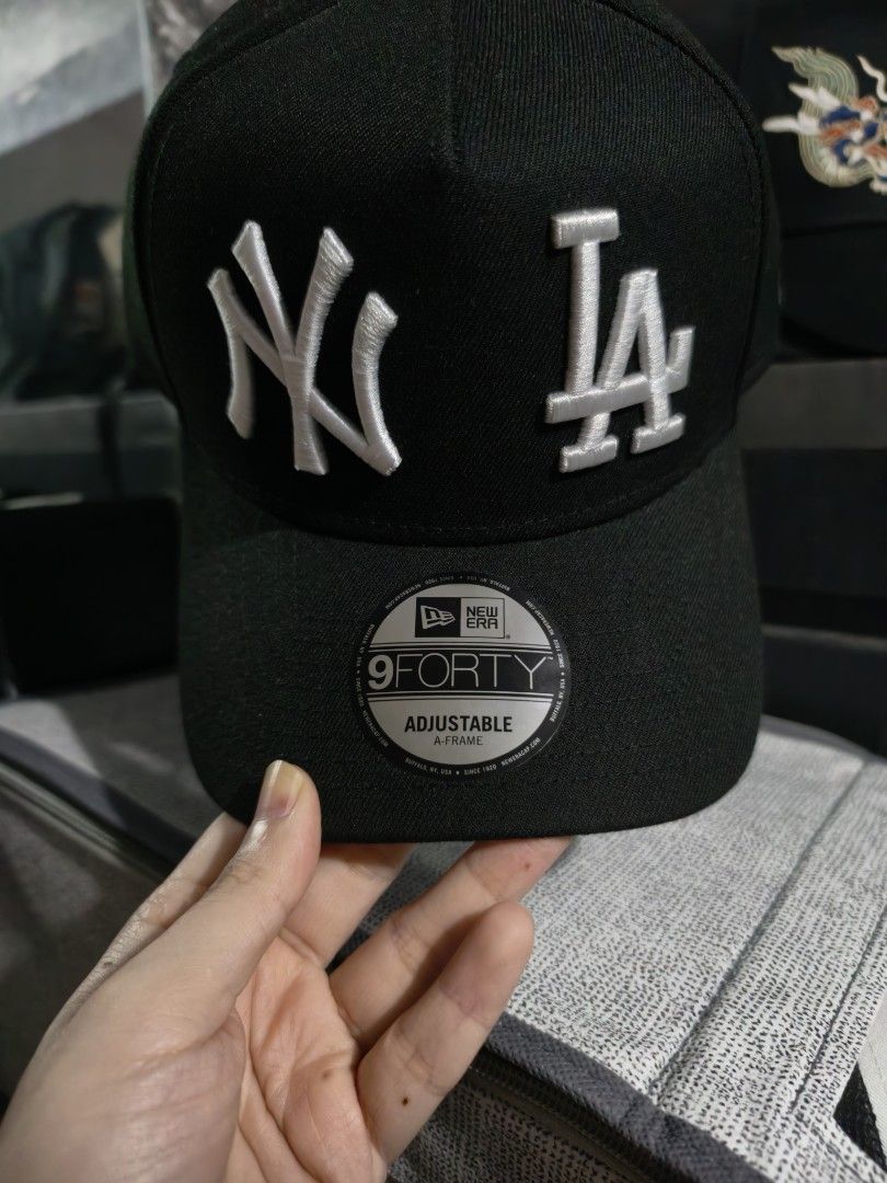 New Era 9FORTY NY x LA A frame (Category: Caps & Hats) located in Bulacan. Submitted by casperchiu2798 (Listing ID 1463284080, Image 1). Description: New Era 9FORTY A frame NY x LA - liked new condition - no issue - 100% Polyester - check pics for details RFS: sobrang dami ng black/white NE caps lalamove/LBC/J&T SJDM Bulacan.