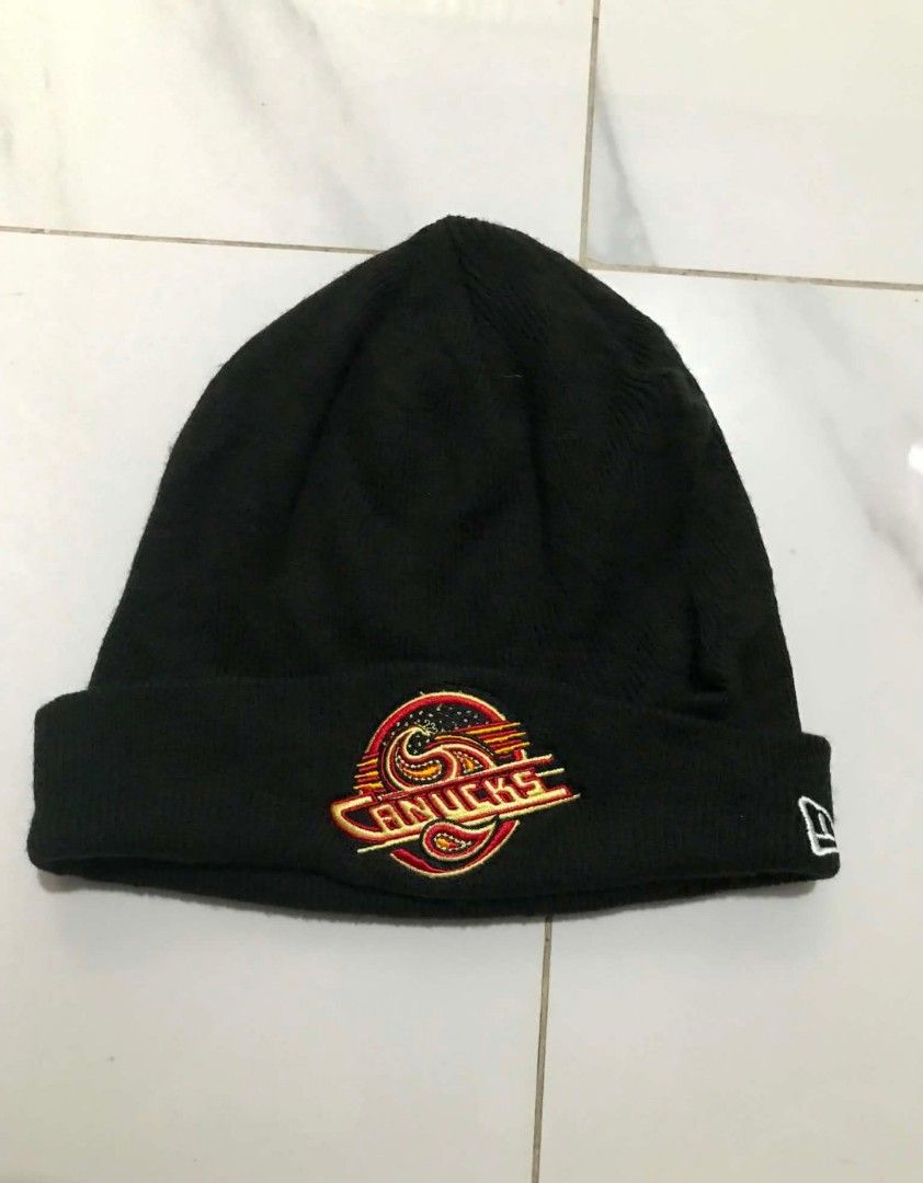 New Era Vancouver Canucks Beanie Hat (Category: Caps & Hats) located in Manila. Submitted by mikeee03 (Listing ID 1463165573, Image 1). Description: - Official New Era Vancouver Canucks beanie - Keep warm and show your team spirit - Ideal for casual wear or game days - A must-have for any Canucks fan.