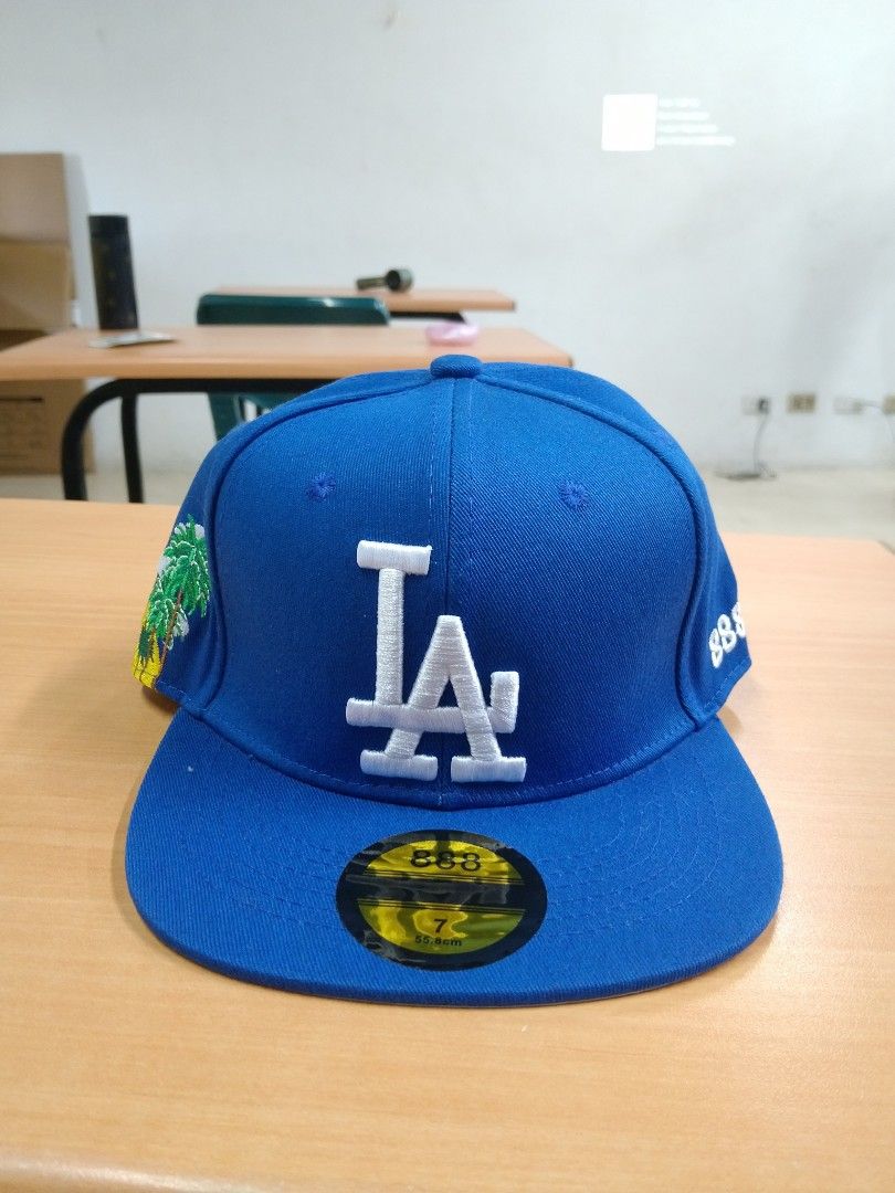 New Era Yankees & LA Dodgers Snapback Caps (Category: Caps & Hats) located in Paranaque City. Submitted by ruyyansidd39958 (Listing ID 1463150341, Image 3). Description: - Collection of New Era snapback caps - Includes iconic Yankees and LA Dodgers designs - Some caps feature stylish floral embroidery - Unique patches add a special touch - Original stickers still attached - Ideal headwear for any fans.