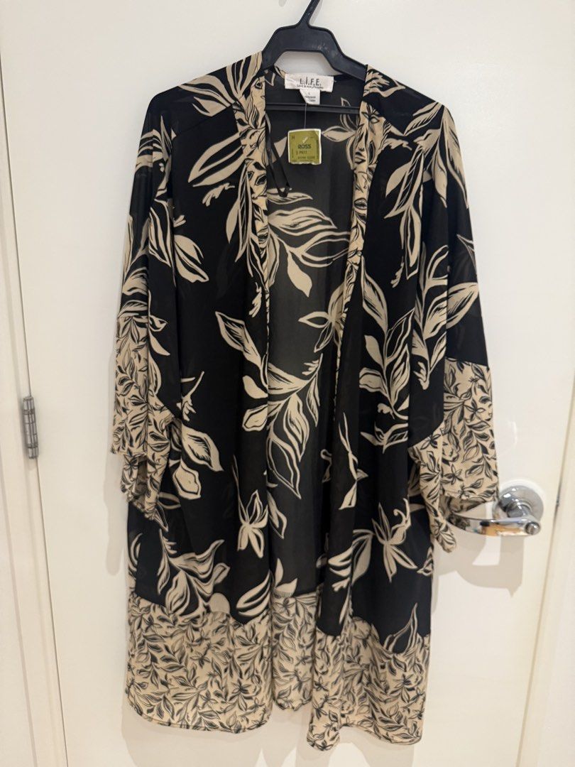 New Long kimono kaftan coverup (Category: Coats, Jackets and Outerwear) located in Makati City. Submitted by nmvs1 (Listing ID 1463136972, Image 1). Description: Bought is Ross US Brand: Life Black and white long kimono kaftan blouse coverup Large fits all sizes.
