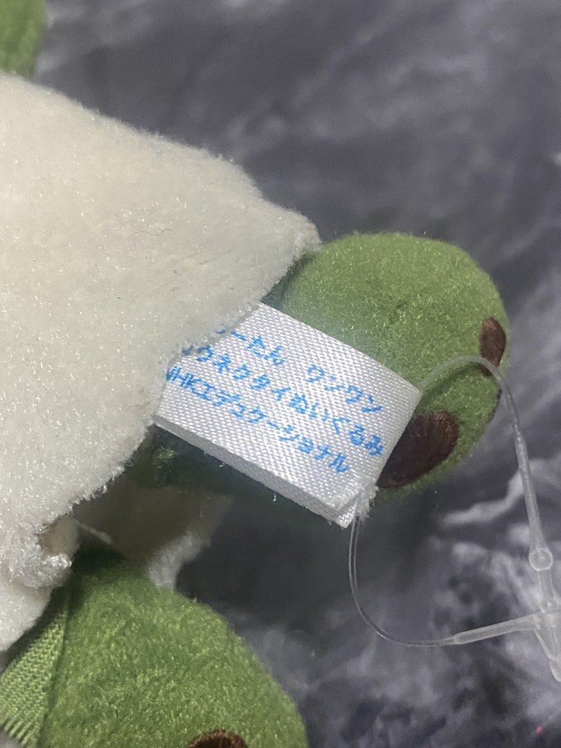 NHK Educational Dog Plush Toy (Category: Plushies & Soft Toys) located in Manila. Submitted by kuya_moto (Listing ID 1463243356, Image 2). Description: - Adorable plush toy dog - Features green ears, feet, and a green bow tie - From NHK Educational - Soft and huggable material - Ideal for collectors or as a thoughtful gift.