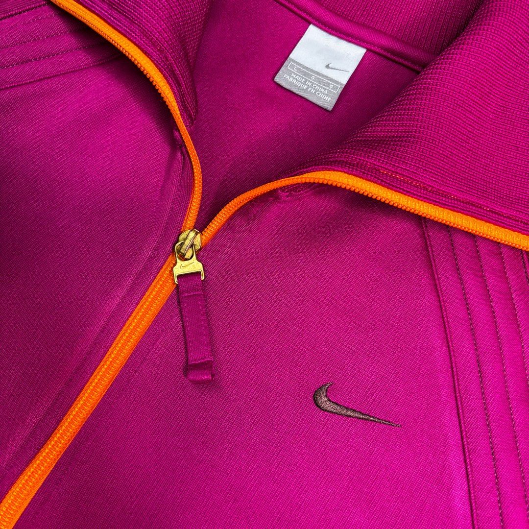Nike | Track Jacket. (Category: Coats, Jackets and Outerwear) located in Manila. Submitted by bypiecesandstories (Listing ID 1463229235, Image 3). Description: Nike | Track Jacket. 899 PHP 🧡 Perfect Condition Can Fit — X Small to Medium Dimensions — W 20.5" L 23.5" A standout Nike track jacket in a vibrant purple and orange combination. An easy way to bring a pop of color to your everyday look. • REMINDERS • — Read the Rules & Guidelines under F