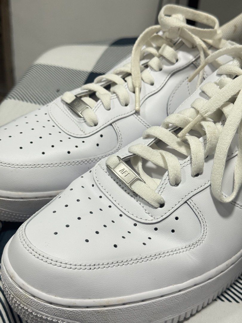 Nike Air Force 1 '07 White Men's Size 12 (Category: Sneakers) located in Bulacan. Submitted by happy0666 (Listing ID 1463243495, Image 2). Description: - Classic white Nike Air Force 1s - Size: 12 US Men's Rfs: Twice lang nagamit. Malaki sa asawa ko. Need money Issue: nadumihan sa loob dahil sa taguan. No box..