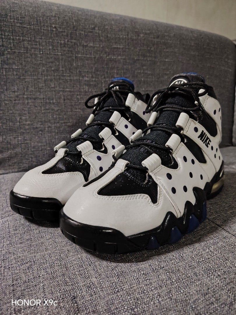 Nike Air Max CB 94 (Category: Sneakers) located in Quezon City. Submitted by 28works (Listing ID 1463261200, Image 2). Description: - Classic Nike Air Max CB 94 - White leather with black and purple accents - High-top design for ankle support - Suitable for basketball or casual wear - Black laces - Black soles with blue detailing.