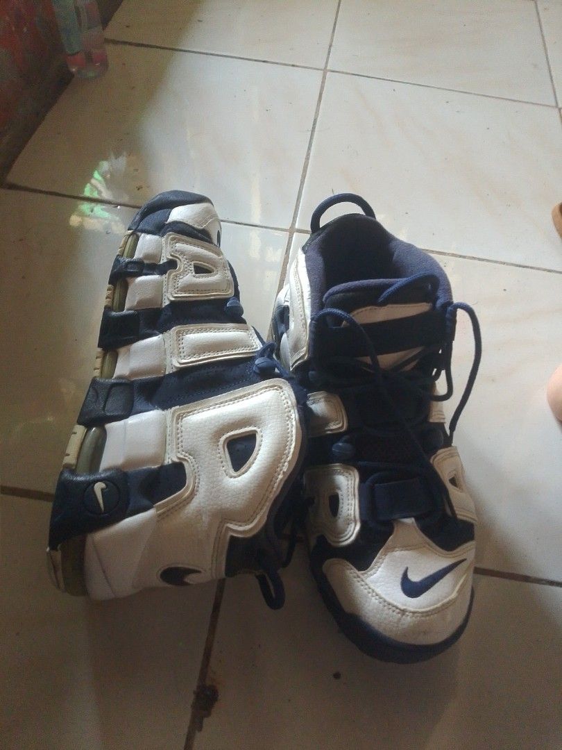 Nike Air More Uptempo White Navy (Category: Sneakers) located in Davao. Submitted by mrsuavenz (Listing ID 1463158278, Image 1). Description: - Classic Nike Air More Uptempo sneakers - White and navy blue colorway - Lace-up closure with velcro straps for a secure fit - Iconic chunky sole - Great for everyday wear or basketball - A must-have for any sneaker collection.