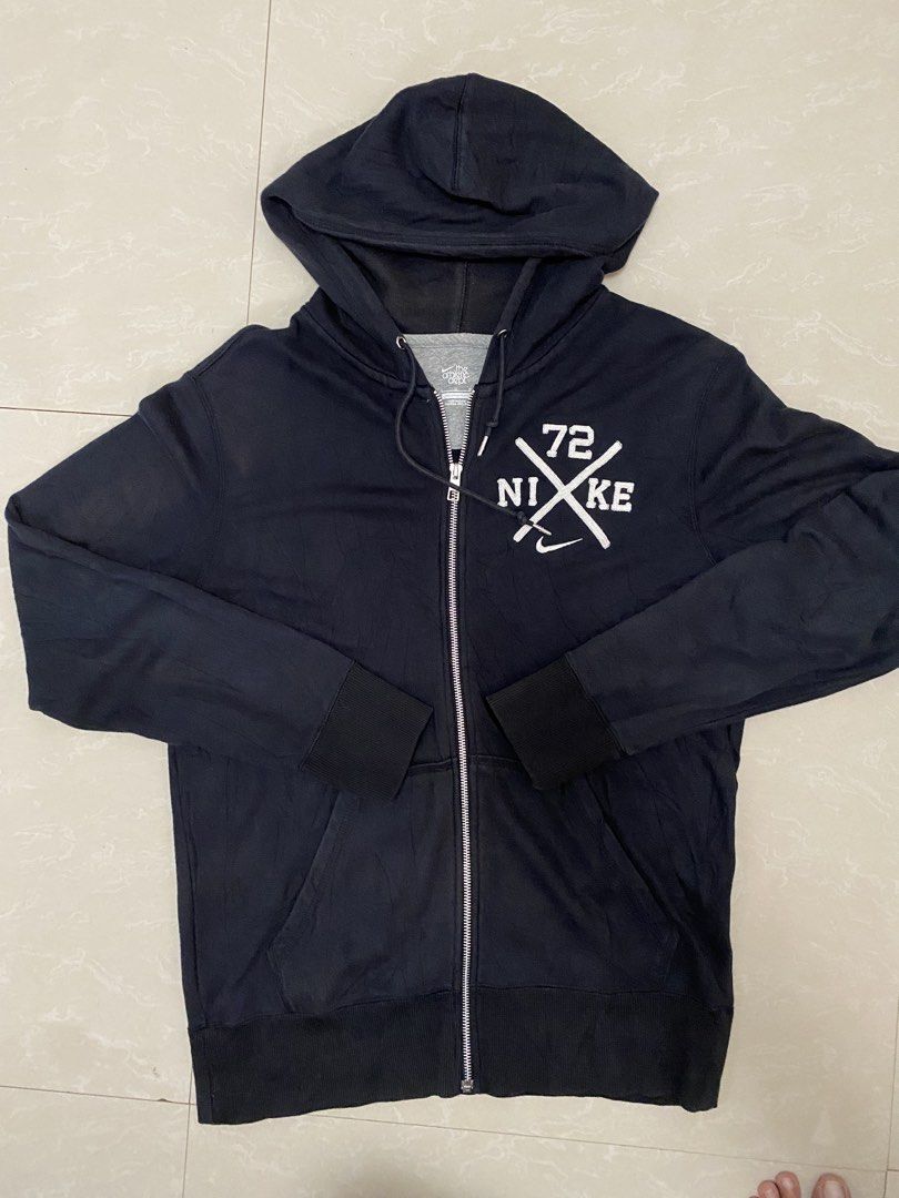 Nike Athletic Dept. Full Zip Hoodie (Category: Coats, Jackets and Outerwear) located in General Trias. Submitted by jcbucks777 (Listing ID 1463232623, Image 1). Description: - Black Nike hoodie from the Athletic Dept. line - Features a graphic print with '72' and 'NIKE' on the chest - Full zip closure - Drawstring hood - Made in China - Size: L.