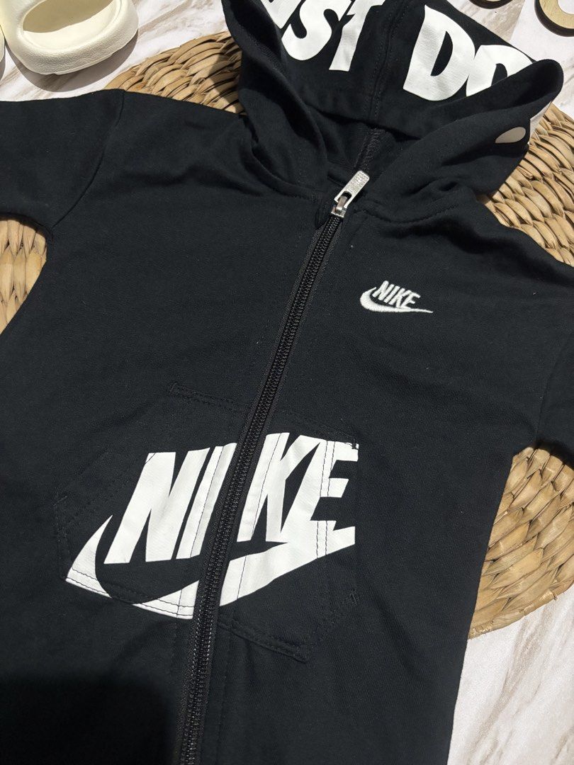 Nike Baby Black "Just Do It" Zip-Up Romper (Category: Babies & Kids Fashion) located in Bacoor. Submitted by ruziels. (Listing ID 1463277224, Image 3). Description: - Cute black Nike baby romper - Features "Just Do It" slogan on the hood - Large Nike logo on the front - Full zip closure for easy dressing - Comfortable and stylish for your baby.