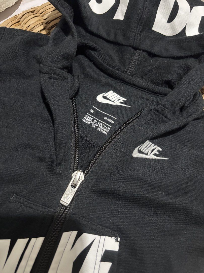 Nike Baby Black "Just Do It" Zip-Up Romper (Category: Babies & Kids Fashion) located in Bacoor. Submitted by ruziels. (Listing ID 1463277224, Image 2). Description: - Cute black Nike baby romper - Features "Just Do It" slogan on the hood - Large Nike logo on the front - Full zip closure for easy dressing - Comfortable and stylish for your baby.