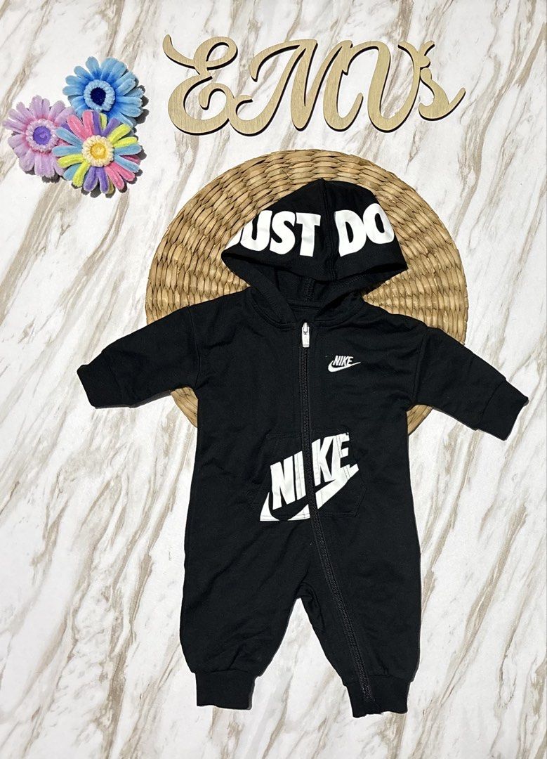 Nike Baby Black "Just Do It" Zip-Up Romper (Category: Babies & Kids Fashion) located in Bacoor. Submitted by ruziels. (Listing ID 1463277224, Image 1). Description: - Cute black Nike baby romper - Features "Just Do It" slogan on the hood - Large Nike logo on the front - Full zip closure for easy dressing - Comfortable and stylish for your baby.