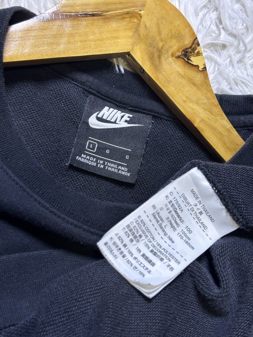 Nike Black Crewneck Sweatshirt Size L (Category: Coats, Jackets and Outerwear) located in Catbalogan. Submitted by christopszxc31 (Listing ID 1463279196, Image 3). Description: - Classic black Nike sweatshirt - Iconic Nike swoosh logo on chest - Made in Thailand - Tagged size L - 21.5x27 - Measurements: Approx. 22" pit to pit, 28" length - Great for everyday wear.