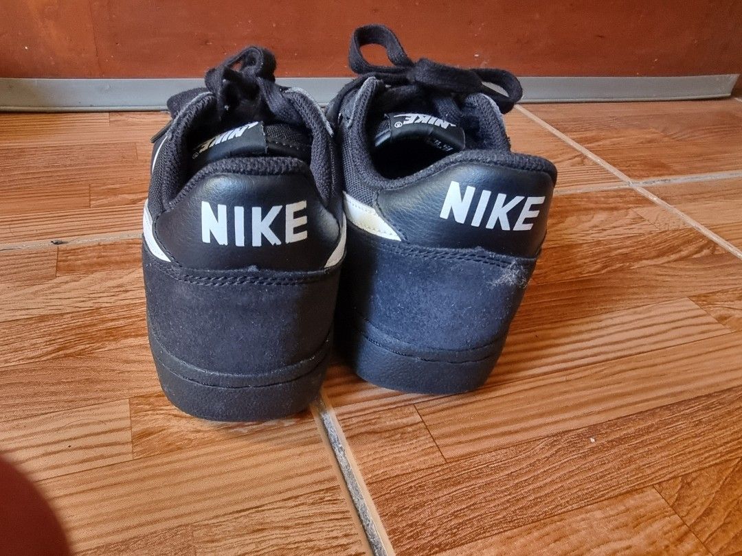 Nike Black Sneakers Size US 9 (Category: Sneakers) located in Paranaque City. Submitted by saifgohar988676 (Listing ID 1463142475, Image 3). Description: - Black Nike sneakers - Size US 9 - Classic Nike swoosh on the side - Shows some wear on soles and heels - Black laces - Perfect for everyday wear.