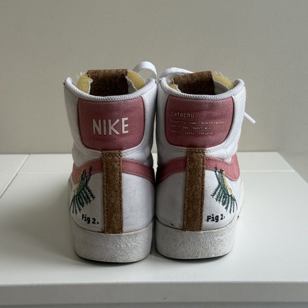 Nike Blazer Mid '77 Fig Tree (size 26.5cm) (Category: Sneakers) located in Taytay. Submitted by gingbns (Listing ID 1463325744, Image 3). Description: - White canvas Nike Blazer Mid '77 - Embroidered fig tree detail on the side - Pink Nike branding on the heel tab - Cork accents on the tongue - Size US 9.5 womens / 26.5 cm - 📍Makati.