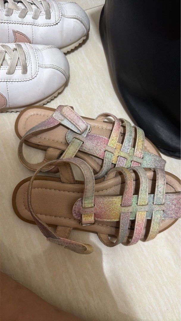 Nike Cortez & Glitter Sandals Bundle (Category: Babies & Kids Fashion) located in Makati City. Submitted by shop4dable (Listing ID 1463226751, Image 2). Description: - Bundle of 2 pairs of kids' shoes - Includes white Nike Cortez with pink accents - Includes sparkly rainbow glitter sandals with adjustable straps - Both shoes have been worn - Great for everyday wear or parties.