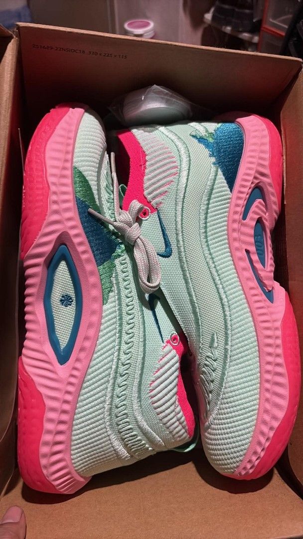 Nike Cosmic Unity 3 Basketball Shoes (Category: Sneakers) located in Pasig City. Submitted by yaku.cozy (Listing ID 1463264238, Image 1). Description: - Lightweight and comfortable basketball shoes - Stylish mint green color with pink and blue accent - Perfect for both playing basketball and casual wear - Comes in the original box - Limited stock, don't miss out! 📍Location: San Miguel, Pasig City.