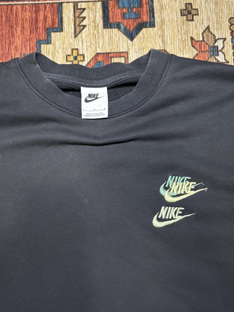 Nike Club Multi Logo Crew Neck Sweatshirt (Category: Coats, Jackets and Outerwear) located in Caloocan City. Submitted by worthysupplies-83215 (Listing ID 1463147539, Image 3). Description: black Nike Club Multi Logo Crew Neck Sweatshirt features stacked multicolor and iridescent Futura graphics across the chest. width: 22.5 inches length: 27 inches sleeve length: 25 inches Good condition 8/10 ₱600 + shipping fee 📍North Caloocan .