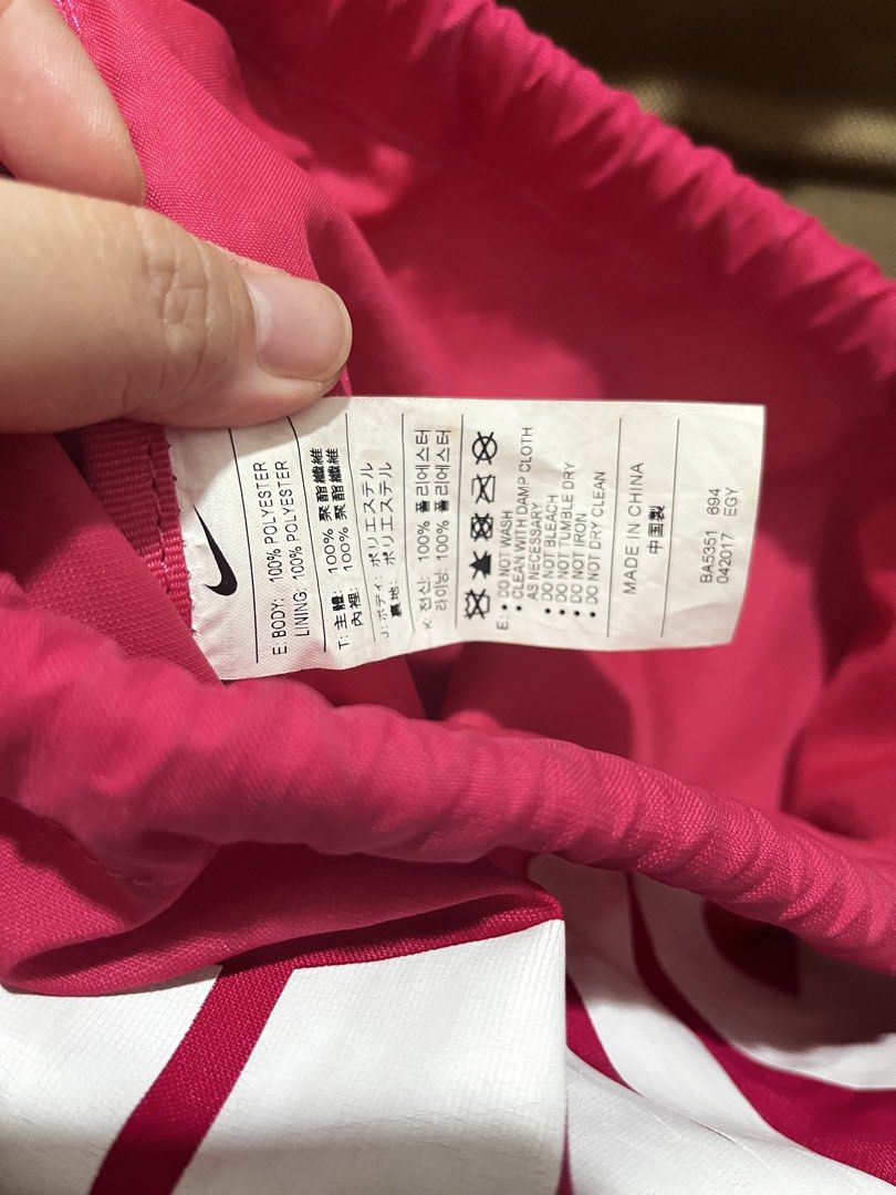 Nike drawstring bag (Category: Cross-body Bags) located in Mandaluyong City. Submitted by kherztan_kherztof_shoppe (Listing ID 1463151750, Image 3). Description: Preloved Minor issue: kindly check photos Rfs: decluttering.