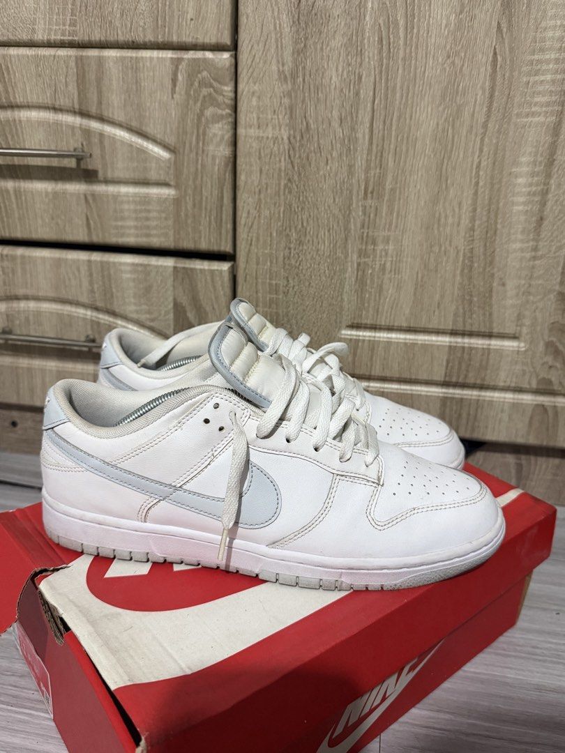 Nike Dunk Low White Sneakers (Category: Sneakers) located in Manila. Submitted by marlboxspace (Listing ID 1463305780, Image 2). Description: - Classic White Nike Dunk Lows - Shows some signs of wear on soles and uppers - Plenty of life left for continued use - Includes original box - Perfect addition to any sneaker collection Konting cleaning lang naka tambak lang used 3x lang siguro palinis nalang bought is for 6k+ ata.