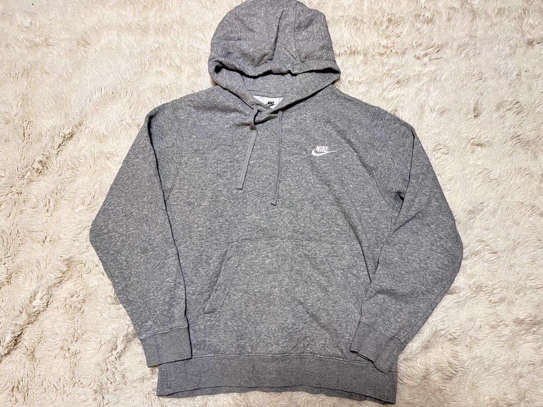 Nike Grey Pullover Hoodie Sweatshirt (Category: Coats, Jackets and Outerwear) located in General Santos City (Dadiangas). Submitted by crisjayg (Listing ID 1463324750, Image 1). Description: - Grey Nike Hoodie - Size: Medium (M) - Material: 80% Cotton, 20% Polyester (Body); 100% Cotton (Hood Lining) - Origin: Made in Malaysia - Features: Comfortable, stylish, great for everyday wear.