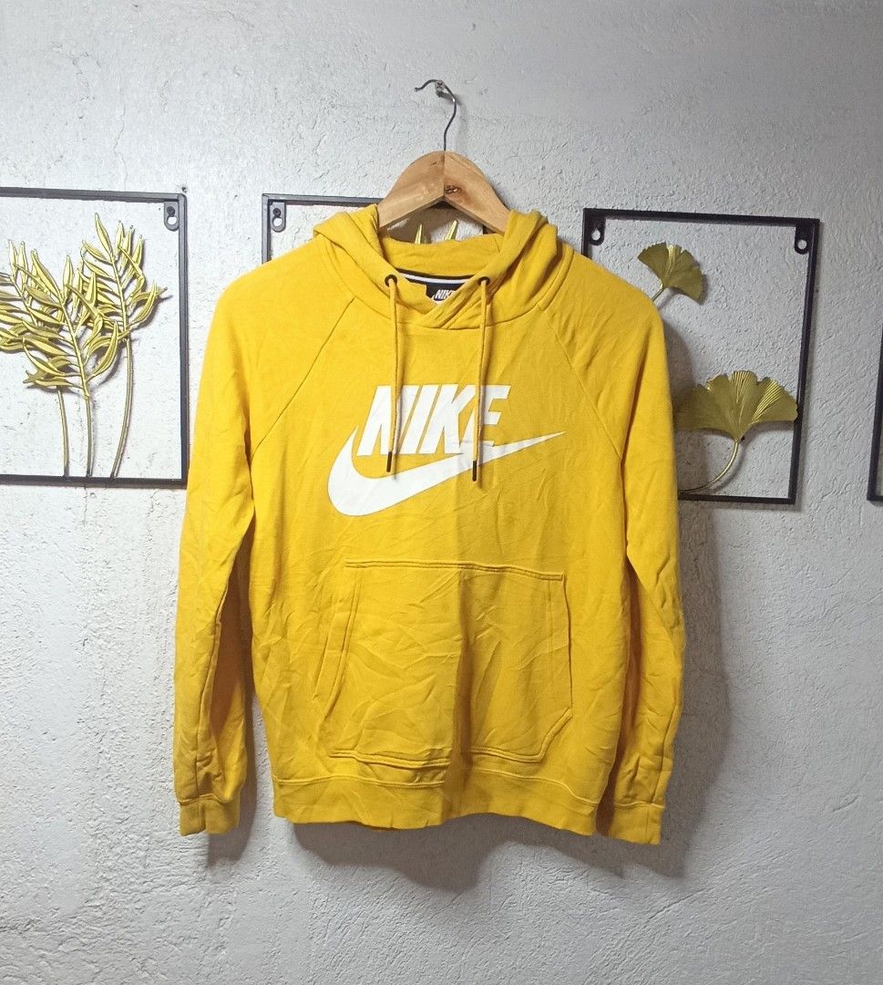 Nike Hoodie (Category: Coats, Jackets and Outerwear) located in Kawit. Submitted by deidzdzn (Listing ID 1463177964, Image 2). Description: - Yellow Nike hoodie - Tagged Size S, fits like a Women's Medium - Measurements: Width 21 inches, Length 24 inches.