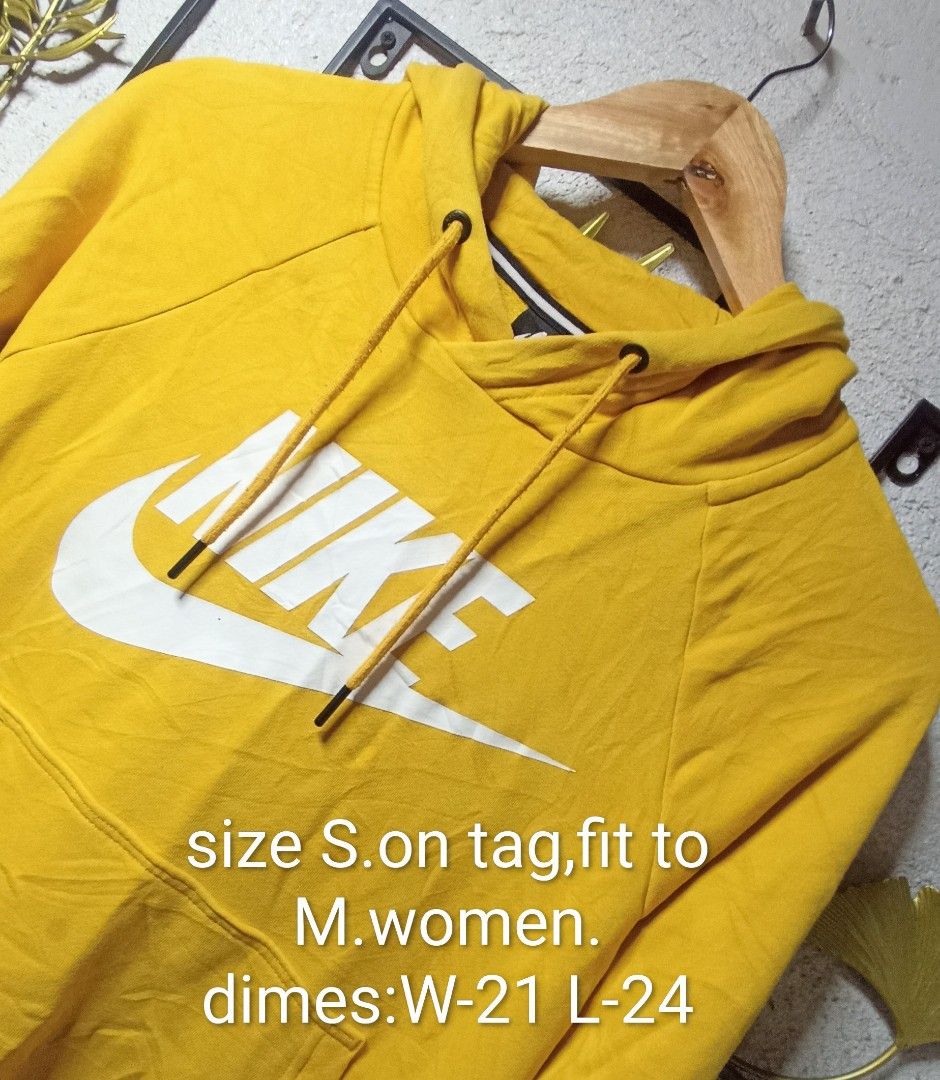 Nike Hoodie (Category: Coats, Jackets and Outerwear) located in Kawit. Submitted by deidzdzn (Listing ID 1463177964, Image 1). Description: - Yellow Nike hoodie - Tagged Size S, fits like a Women's Medium - Measurements: Width 21 inches, Length 24 inches.